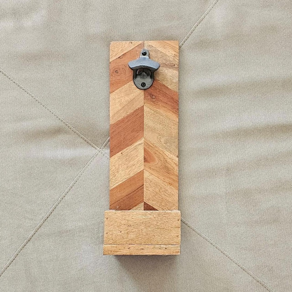 Wooden bottle opener with herringbone wood grain pattern wall mount